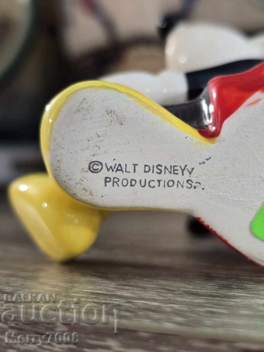 Delivery of Collectible Mickey Mouse figure, with "Walt Disney" stamp