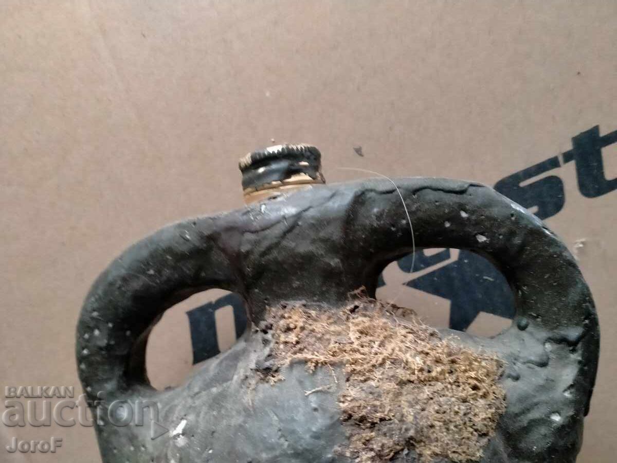 Old bottle with icon with price € 0.01 | 0.02 BGN