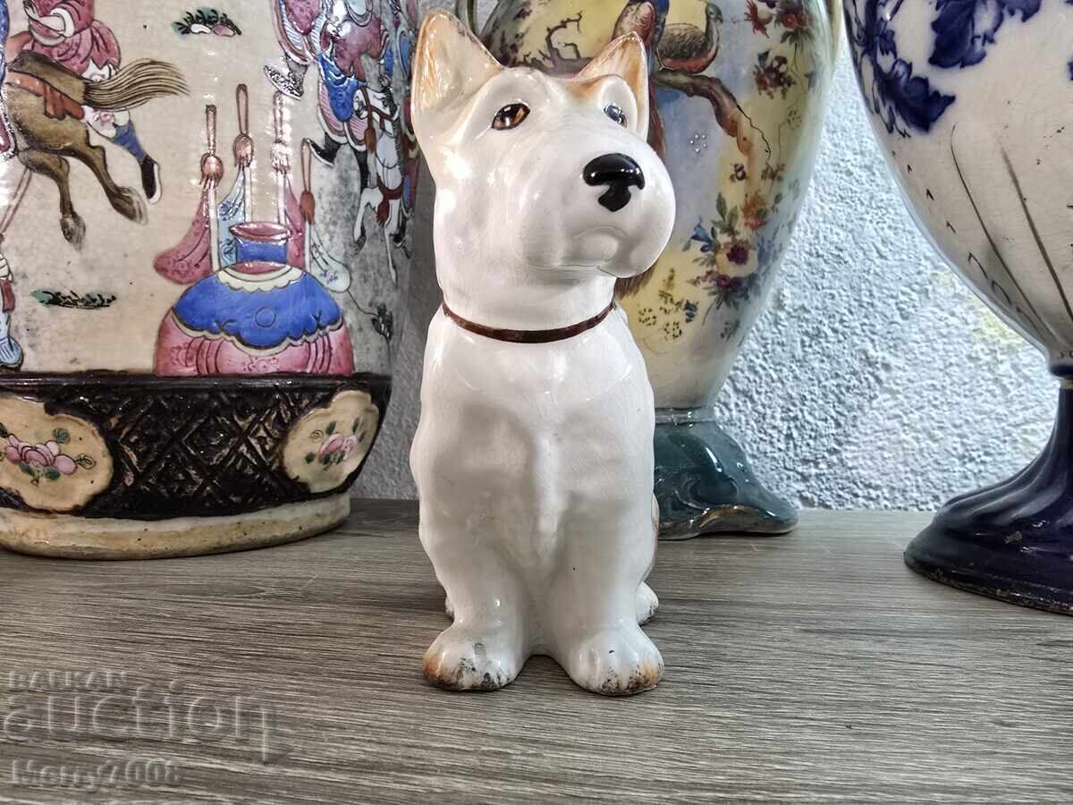 Auction Porcelain figurine of a sitting terrier - inscription "Tinker" Auction Porcelain figurine of a sitting terrier - inscription "Tinker"