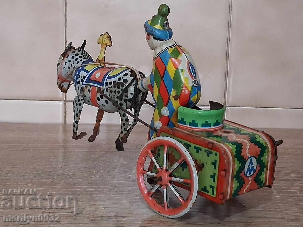 Детска ламаринена играчка жокей кон с двуколка Германия с цена € 44.51 | 87.05 лв.