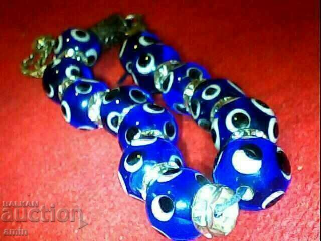 Delivery of beautiful blue eye bracelet made of natural stone