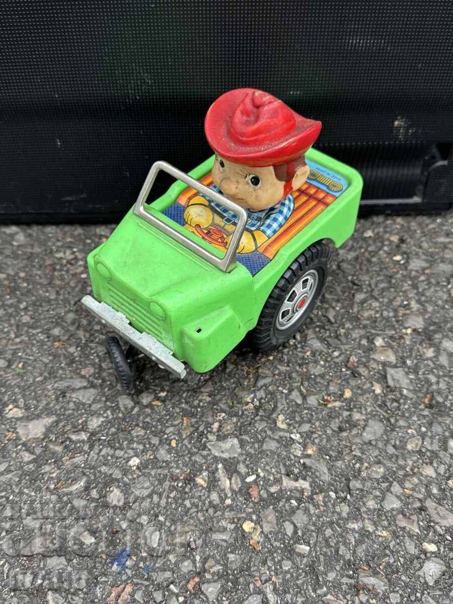 Veche jucărie mecanică metalică japoneză model mașină cowboy cu preț € 10.40 | 20.34 BGN