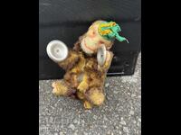 Figurină mecanică veche sub formă de maimuță