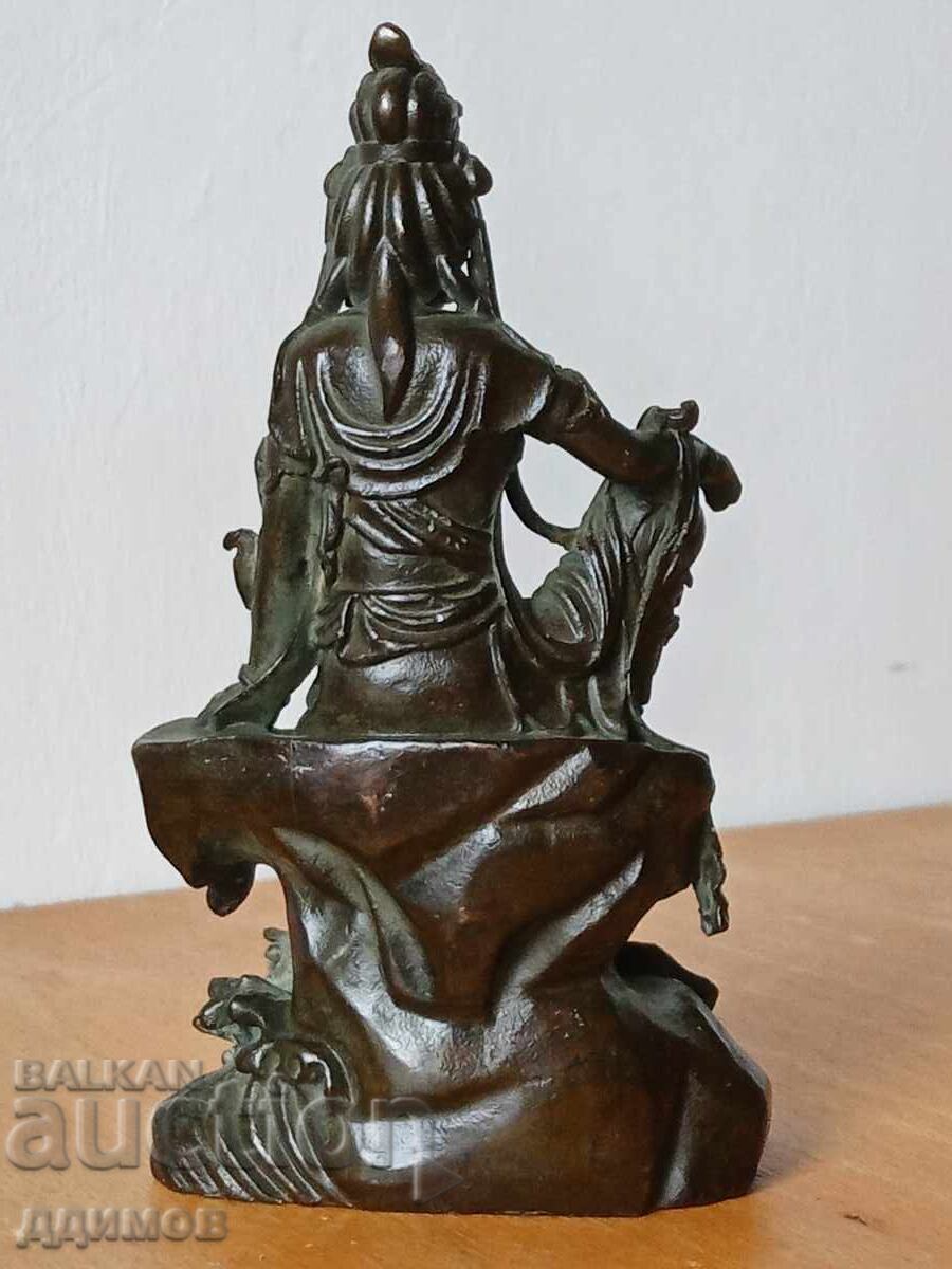 Auction  Young Buddha figurine