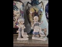 Două figurine de colecție din porțelan fermecătoare!