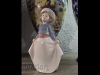 NAO, rychno izrabotena v Ispania ot Lladró prez 1997 g.