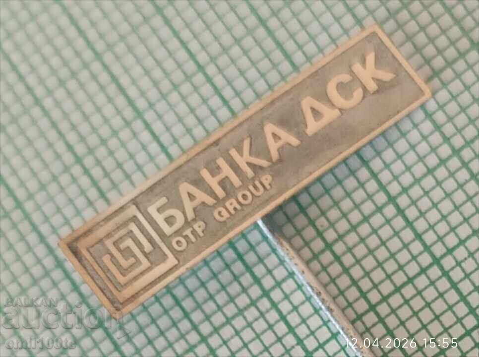 Licitație Insignă - Banca DSK