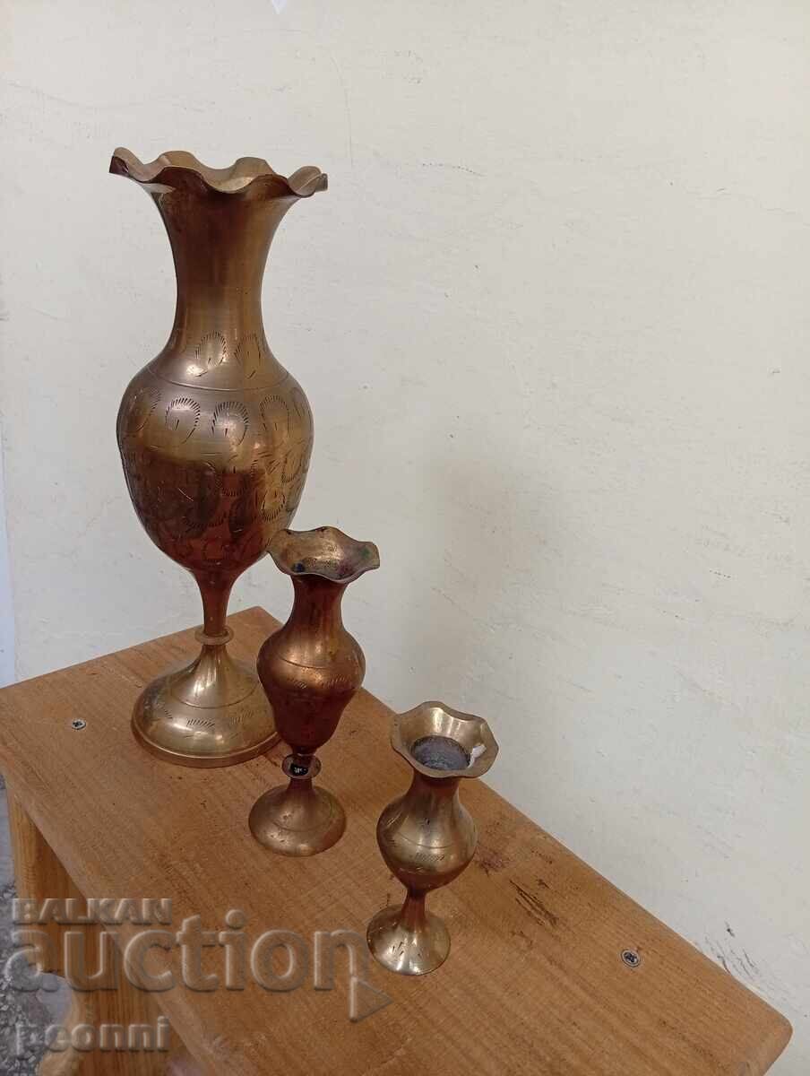 Auction  Three brass vases
