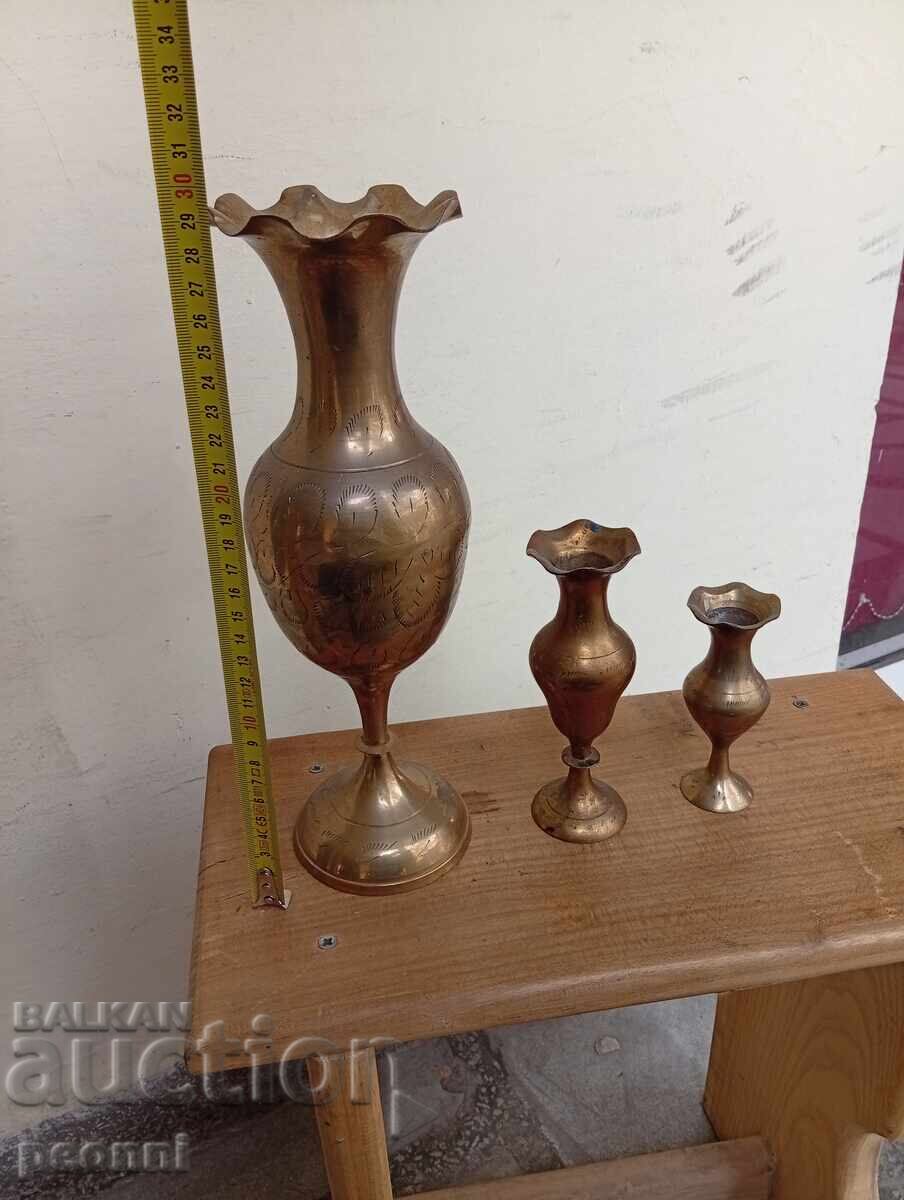 Three brass vases
