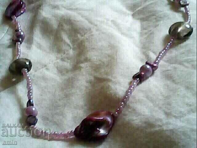 Auction  necklace is a bracelet of natural pearls is gray