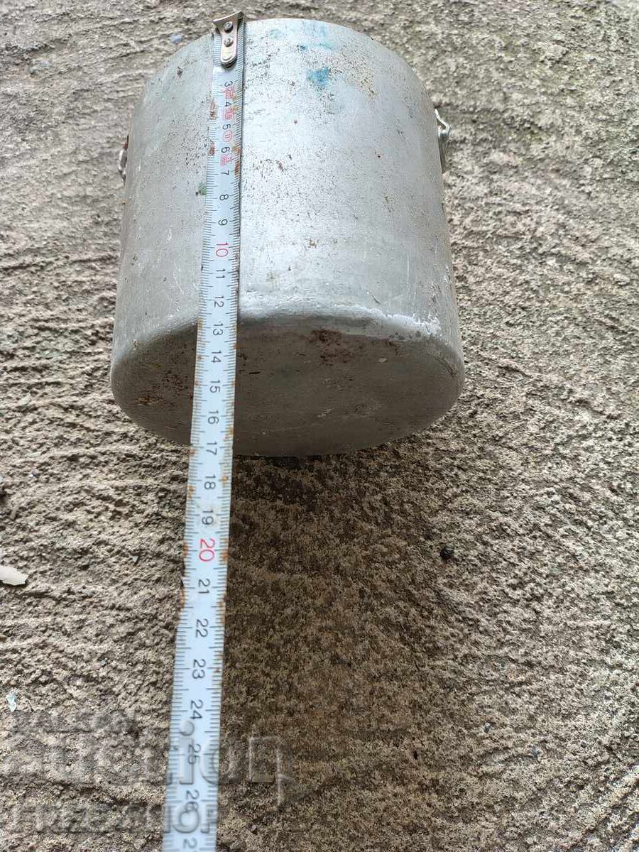 Delivery of Old aluminum milk pot