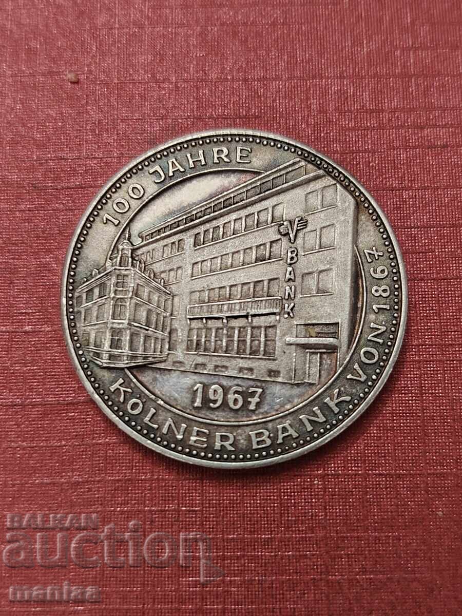 Medalia de argint 100 de ani a Colner Bank 1967 cu preț € 150.00 | 293.37 BGN