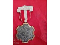 Medalie veche pentru turism