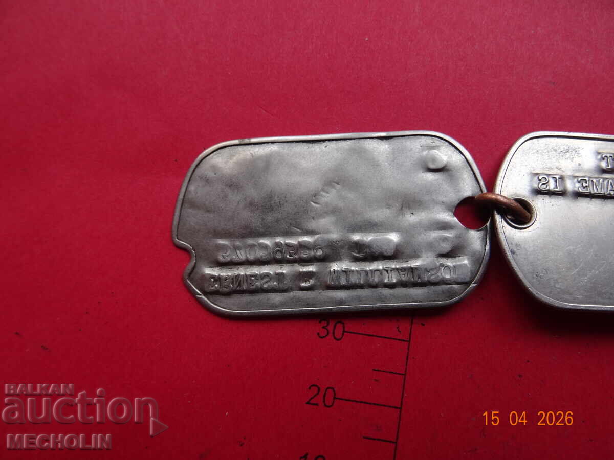 Auction  COLLECTIBLE METAL DOG TAGS