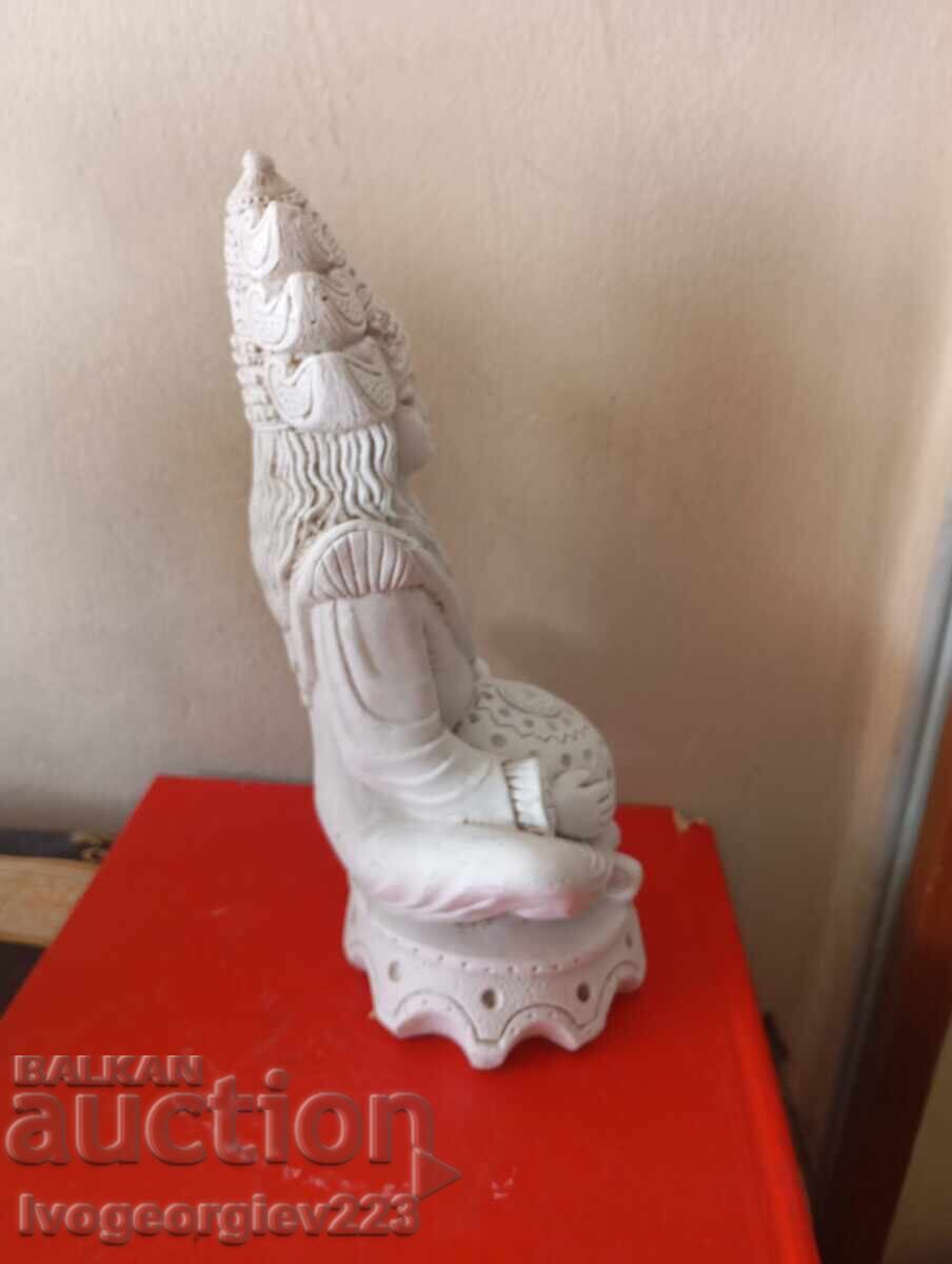 Delivery of Indian deity figurine