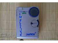 Collectible SANCY transistor radio with earphones