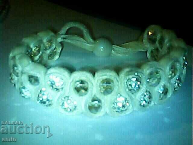 Delivery of a gorgeous necklace is a shambhala bracelet with crystals