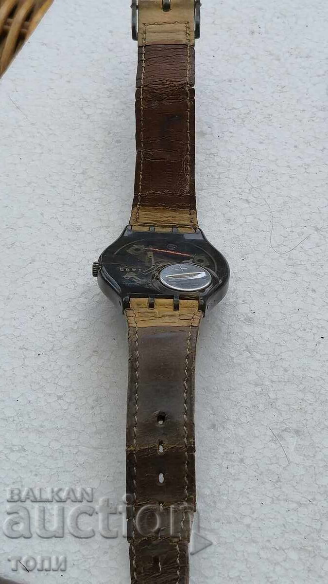 Delivery of SWATCH QUARTZ SWISS MADE RARE I DON'T KNOW IF IT WORKS BZC !!!!