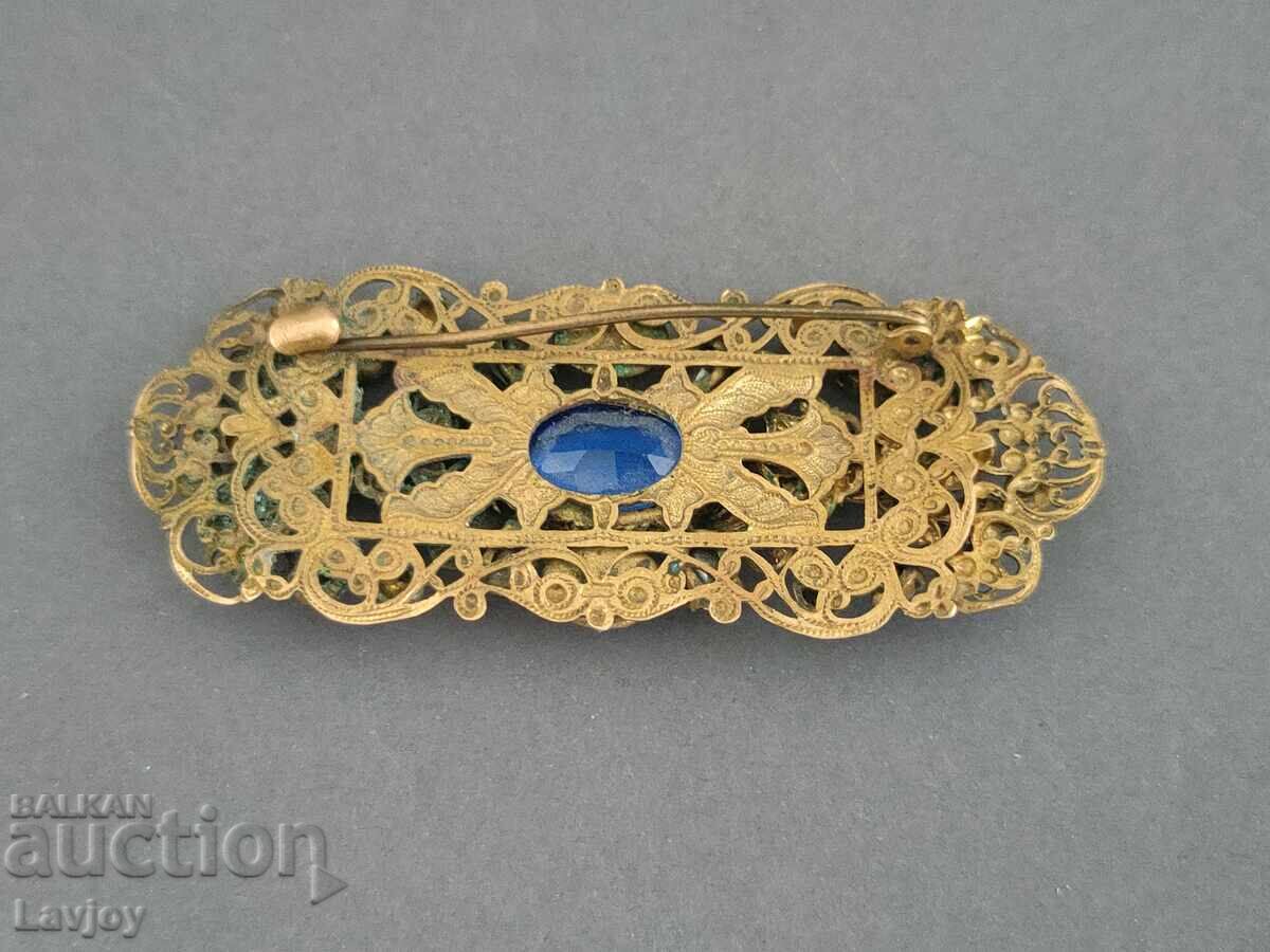 Delivery of Gold-plated vintage openwork brooch with mother-of-pearl