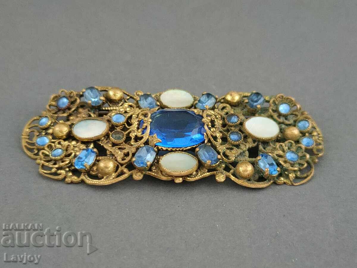 Gold-plated vintage openwork brooch with mother-of-pearl