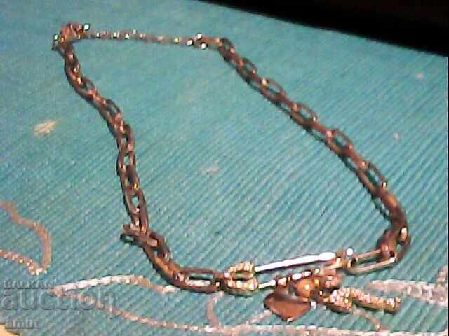 Frumos colier Guess cu 4 cercuri pentru fete/domnișoare