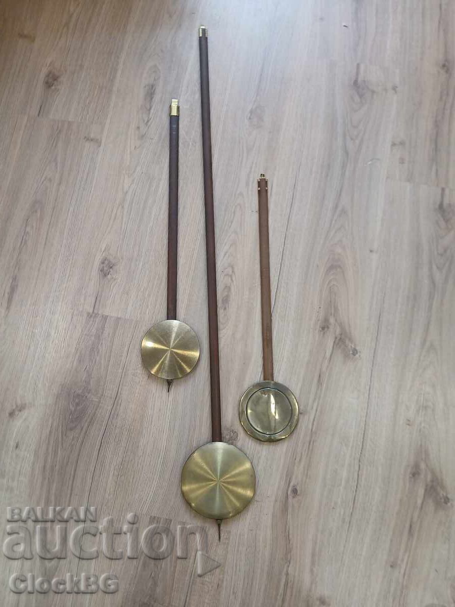 3 clock pendulums
