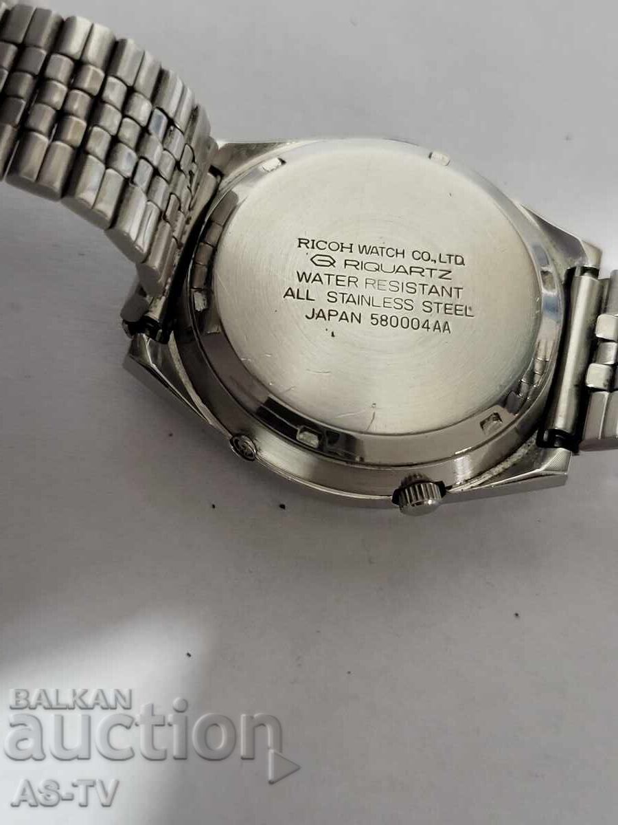 Delivery of Ricoh quartz watch