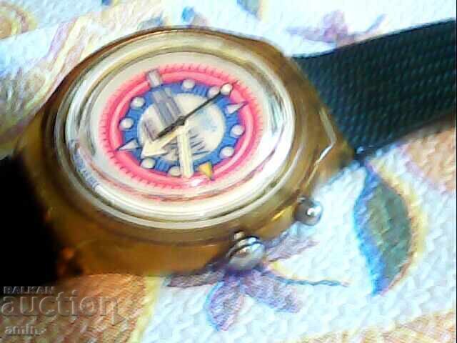 Παράδοση Όμορφο ρολόι Swatch, σε άριστη κατάσταση, καινούργια μπαταρία, λειτουργεί τέλεια