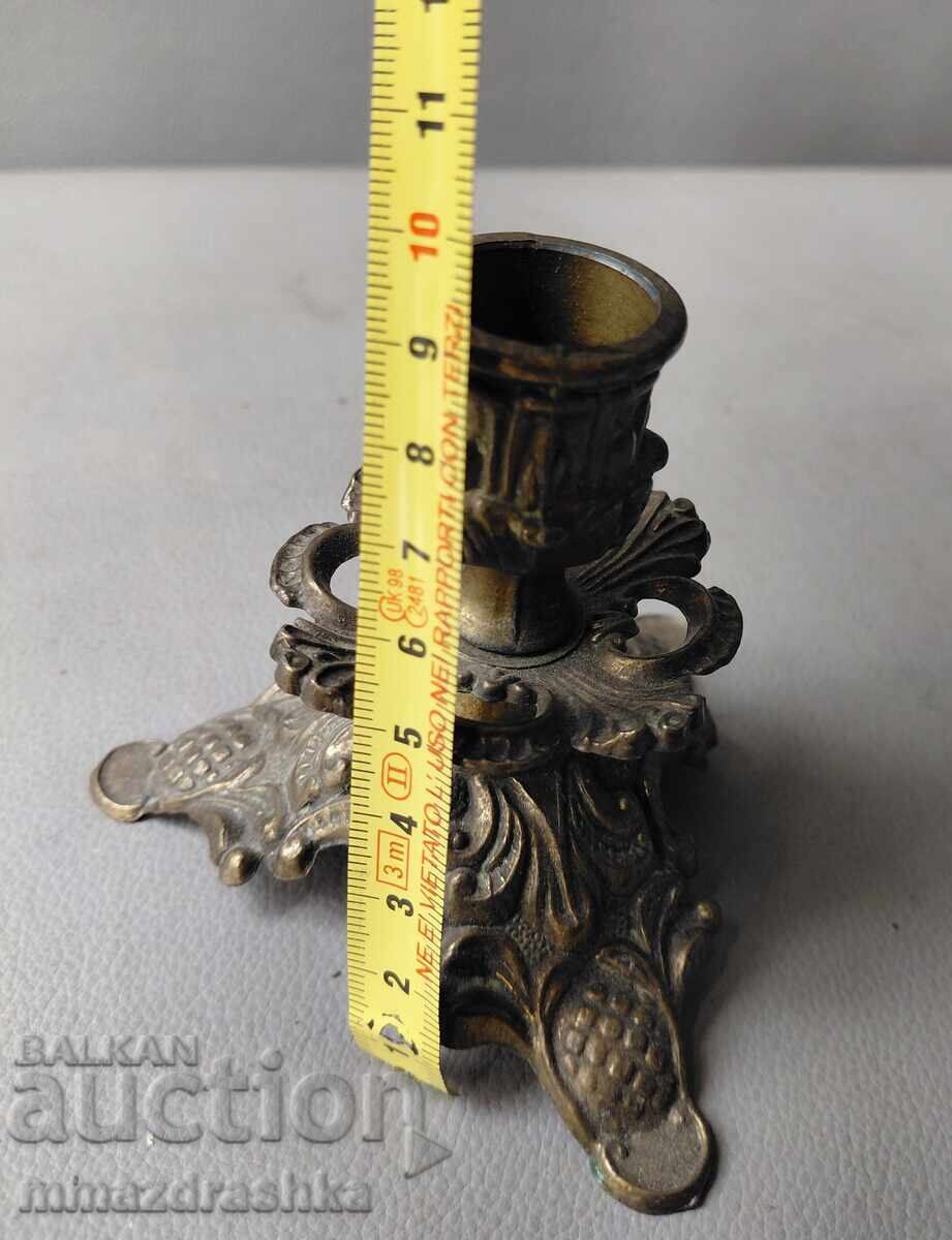 Auction  Small bronze candlestick