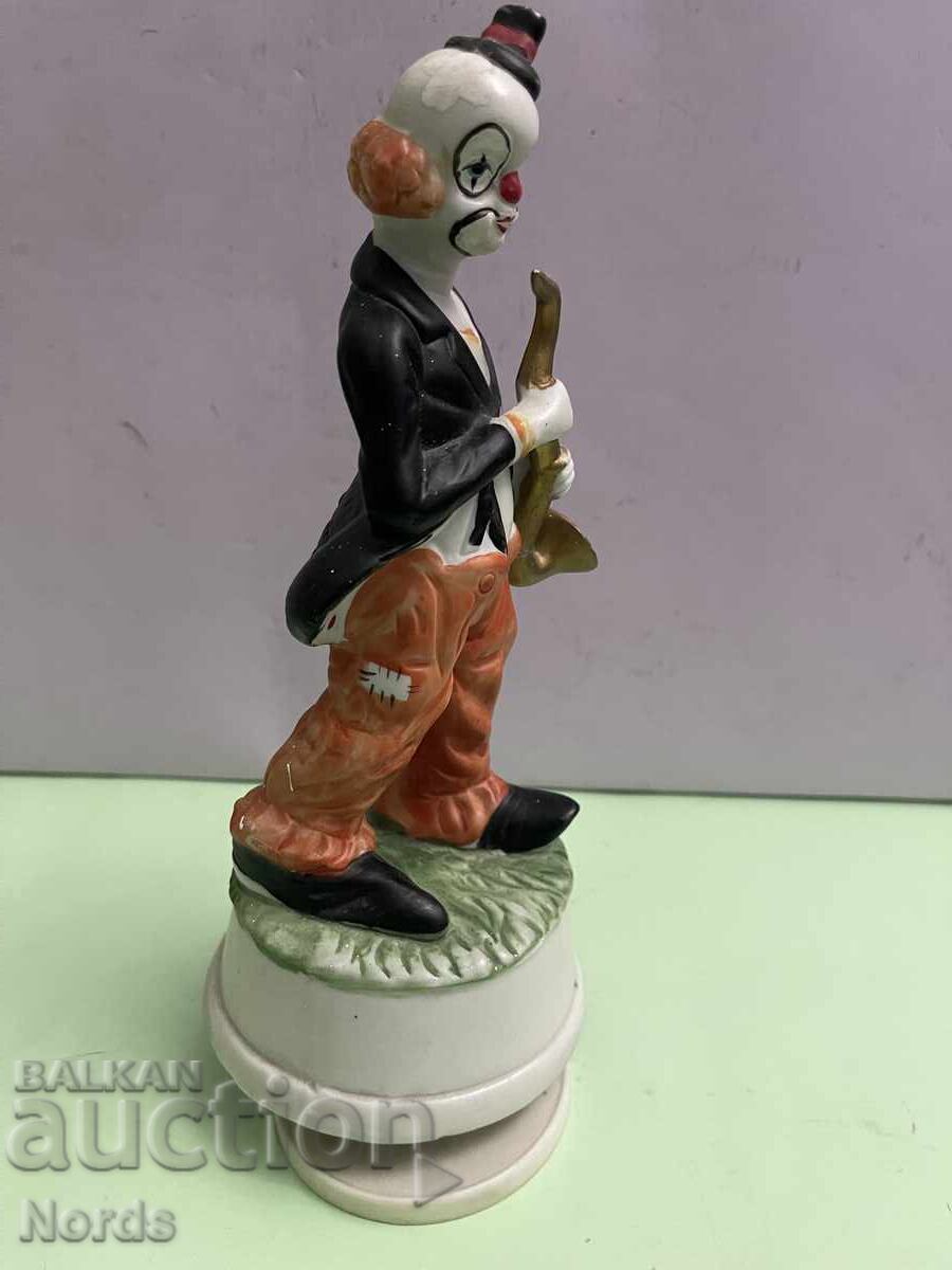 Παράδοση Πορσελάνινη μουσική φιγούρα κλόουν