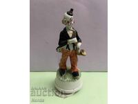 Figurină muzicală din porțelan cu clovn