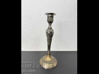 Richly ornamented bronze candlestick. No. 8119