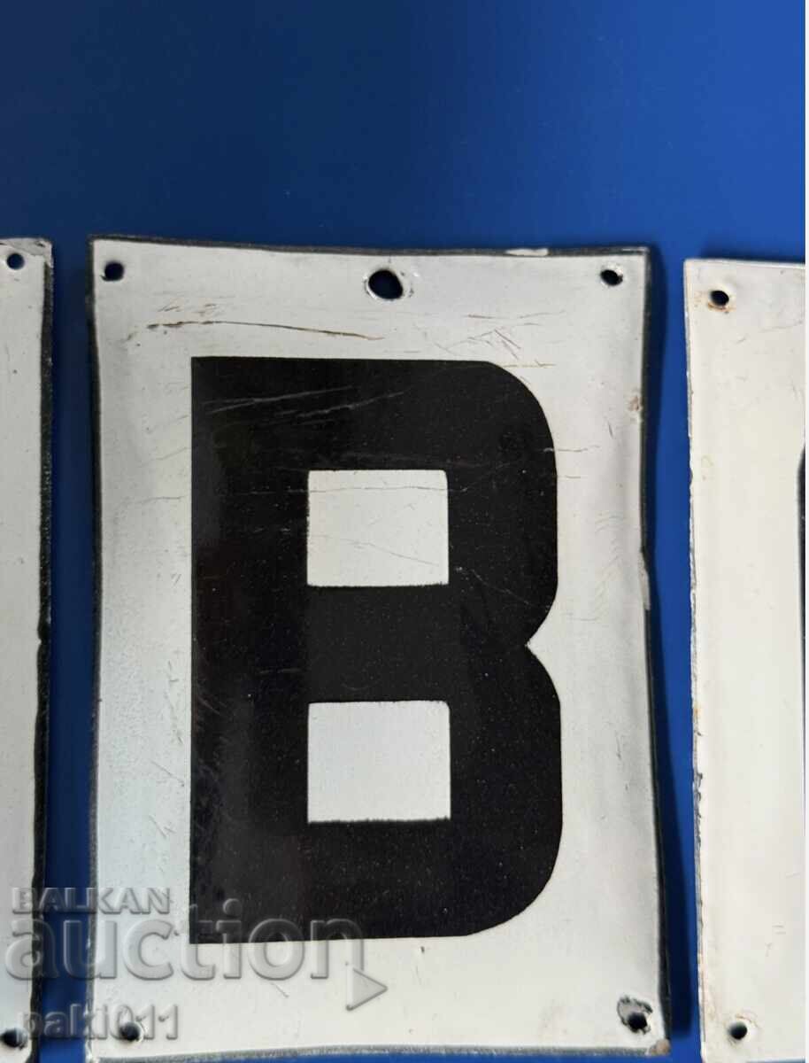 Auction  Lot of three enameled signs with letters A B C