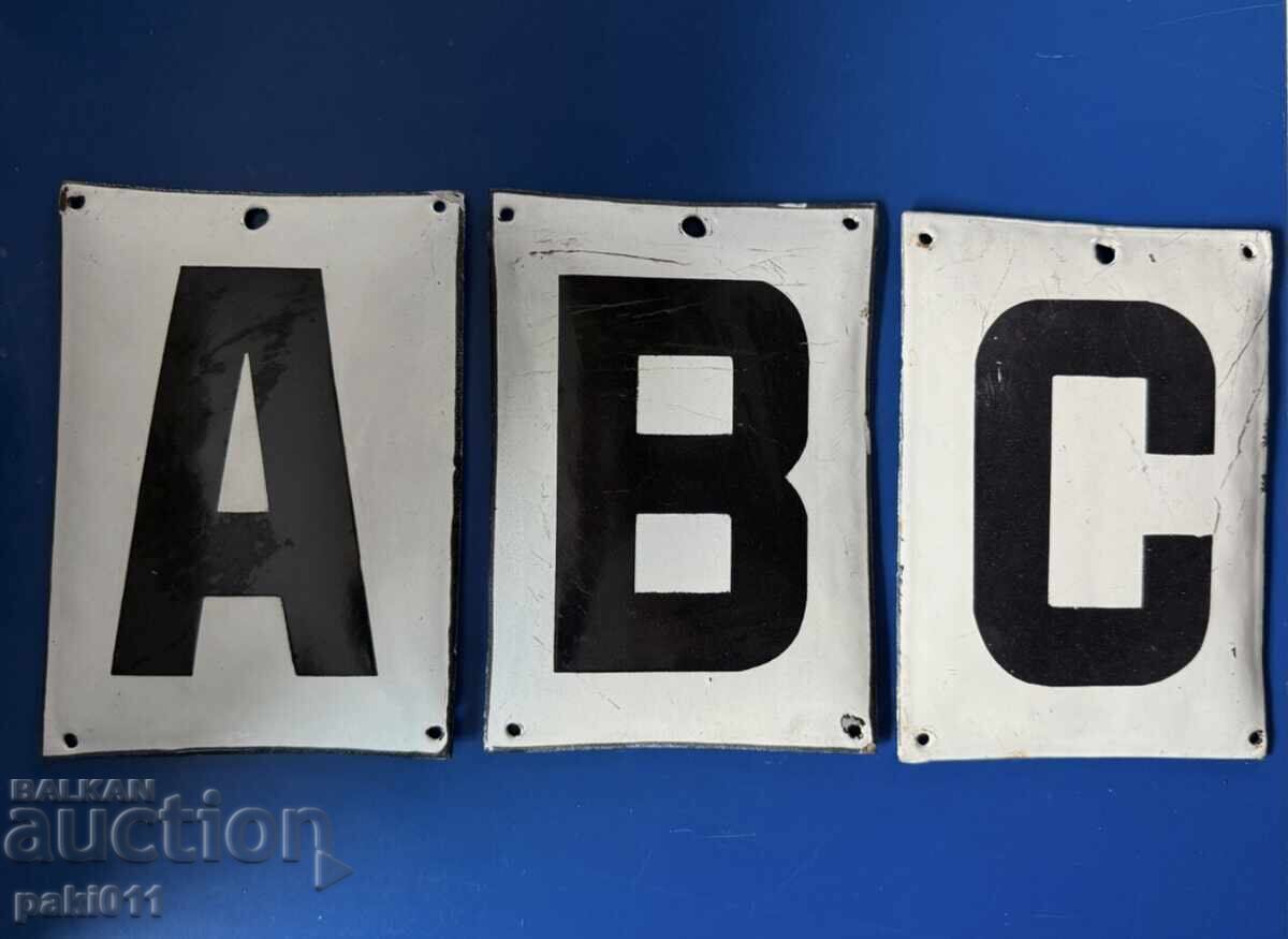 Lot of three enameled signs with letters A B C
