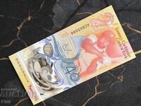 Τραπεζογραμμάτιο - Ανατολική Καραϊβική - 2 δολάρια (Ιωβηλαίο) UNC | 2023