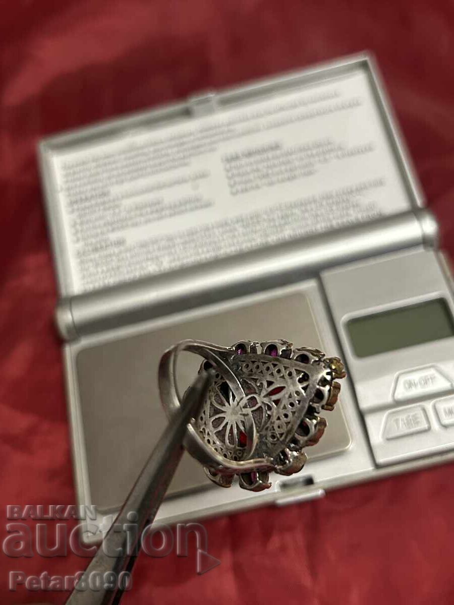 Delivery of Huge silver women's ring, Revival period style