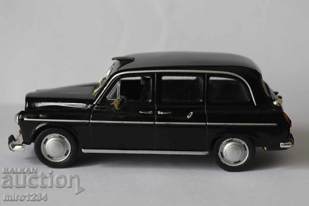MODEL MAȘINUȚĂ JUCĂRIE LONDON TAXI 1/43