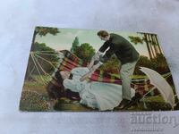 Carte poștală Bărbat și tânără fată stând într-un hamac 1910