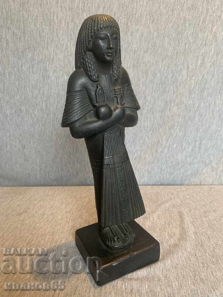 Old statue of the Egyptian goddess Isis