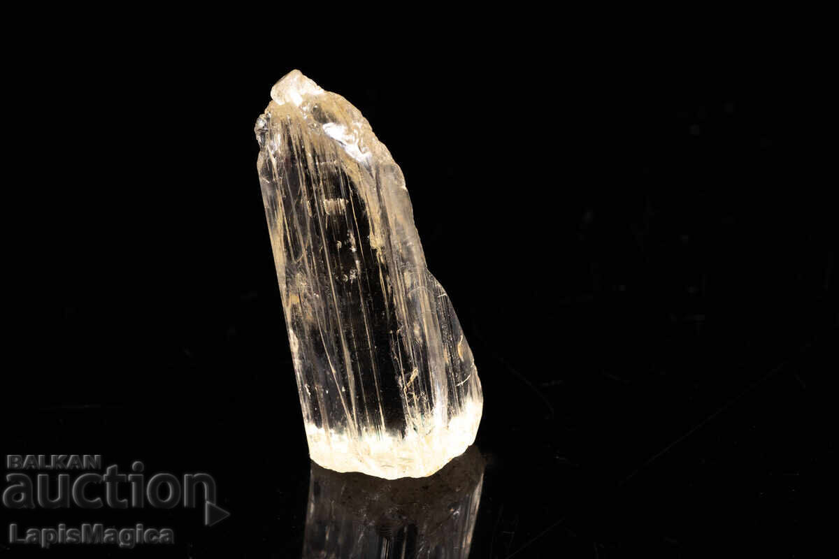 Cristal de scapolit fluorescent 16,1 ct cu preț € 3.50 | 6.85 BGN