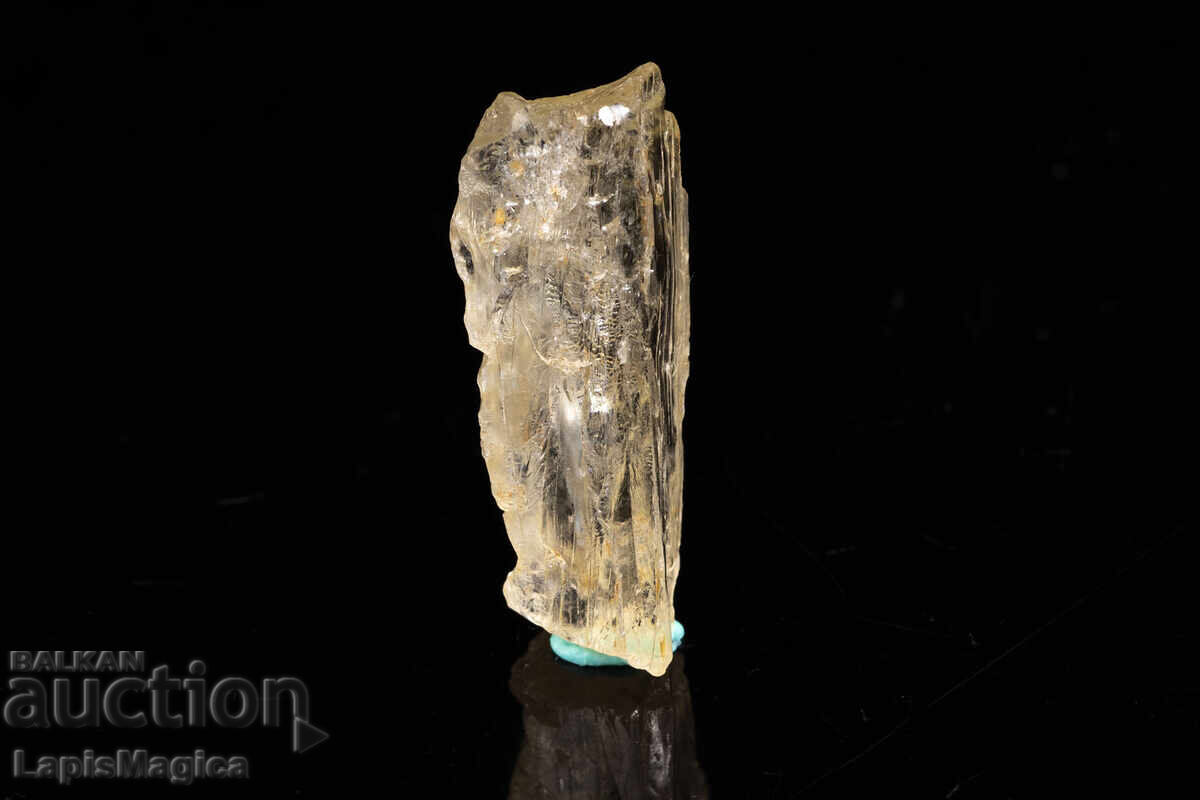 Φθορίζων κρύσταλλος σκαπολίτη 12.8ct με τιμή € 3.50 | 6.85 BGN