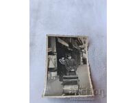 Photo Sofia Officer and woman with a vintage baby carriage