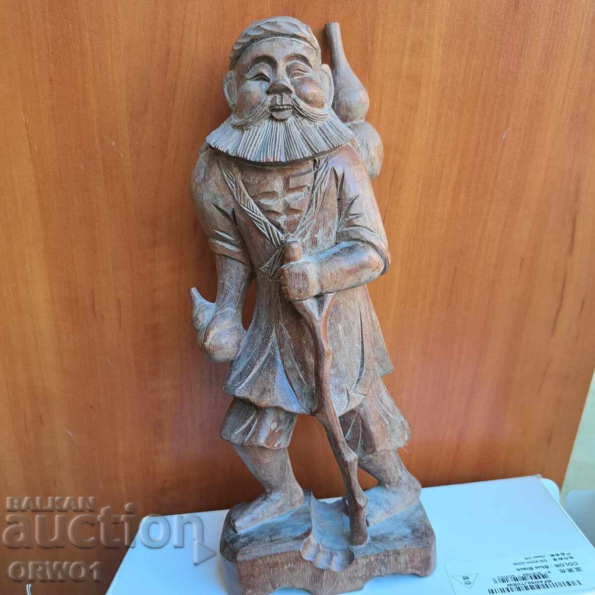 Old Asian wooden figure wood carving