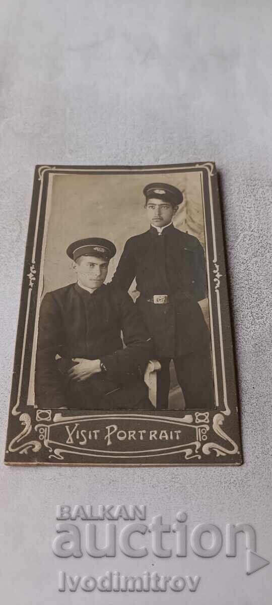 Fotografie Doi tineri în uniforme școlare Carton