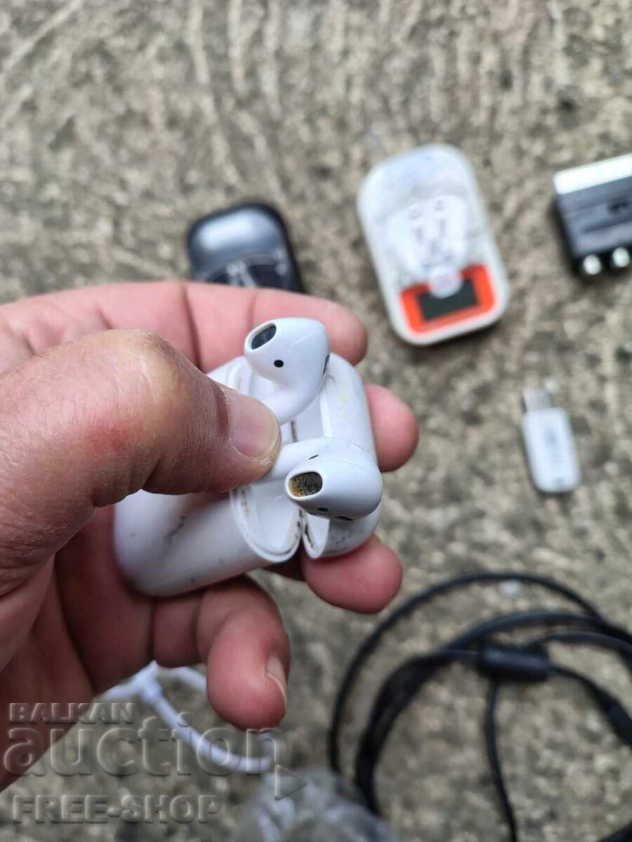 Auction  Lot of battery chargers, headphones, etc