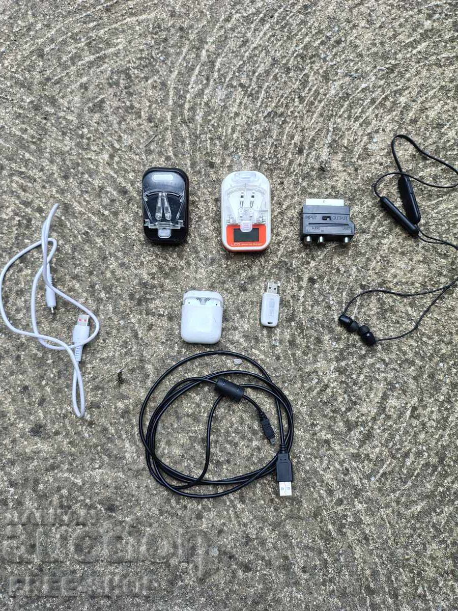 Lot of battery chargers, headphones, etc
