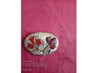 Antique brooch with stones