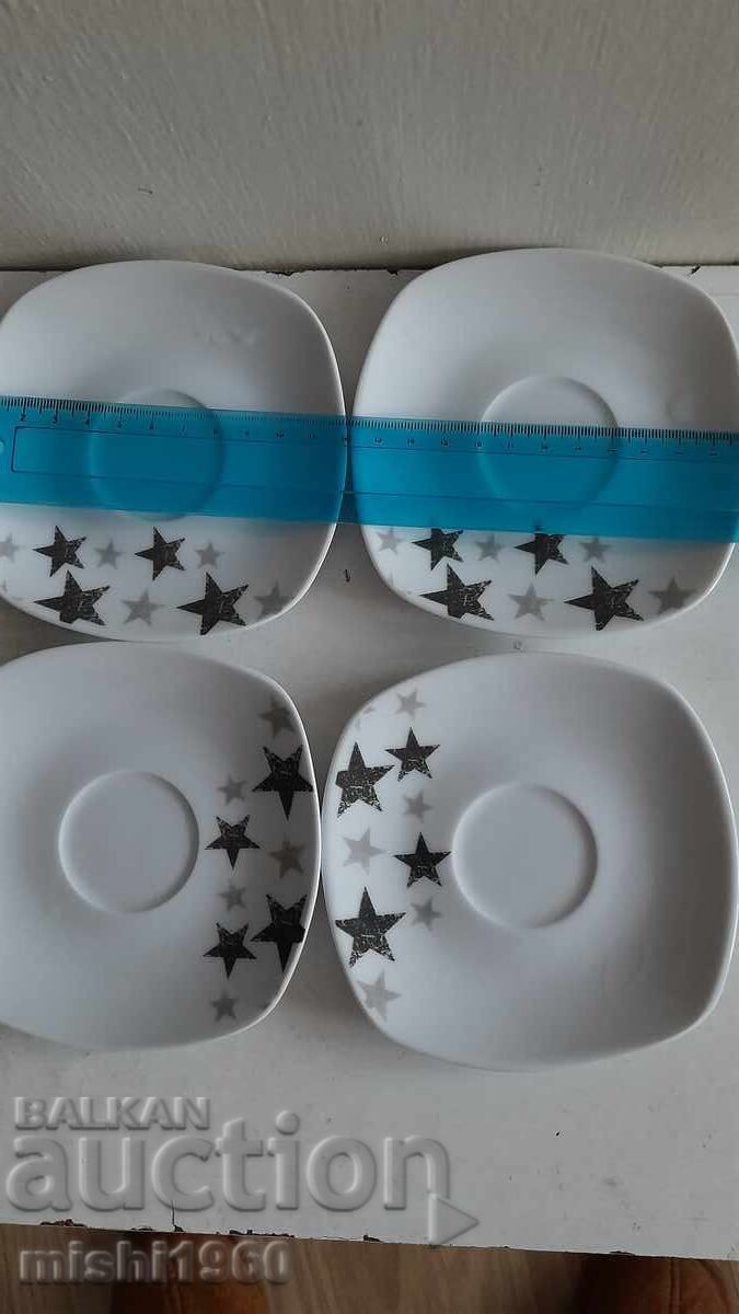 Set of four small plates