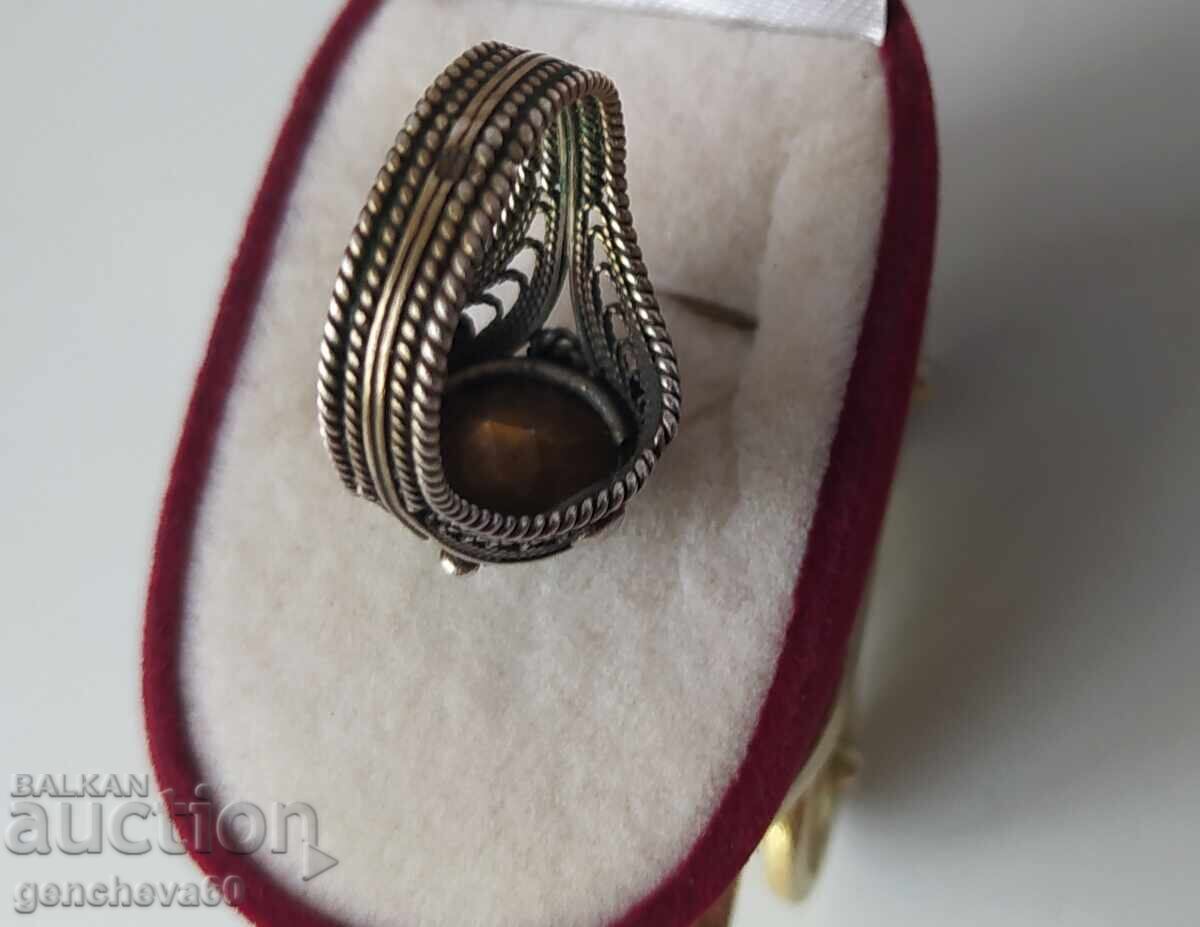 Delivery of Revival period silver filigree ring with blue topaz