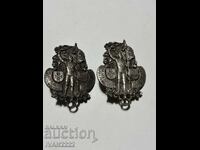 Two old badges